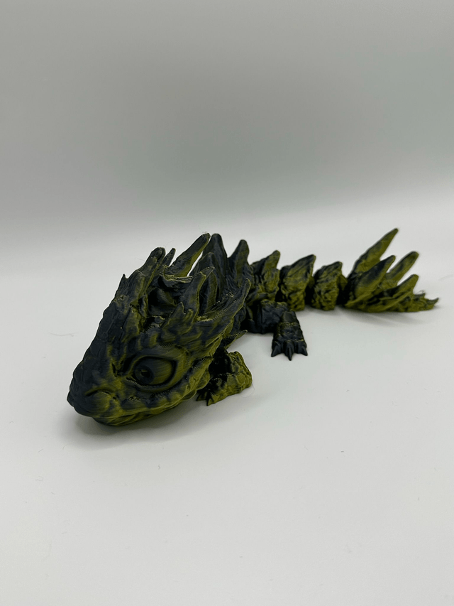 Articulated stone baby dragon